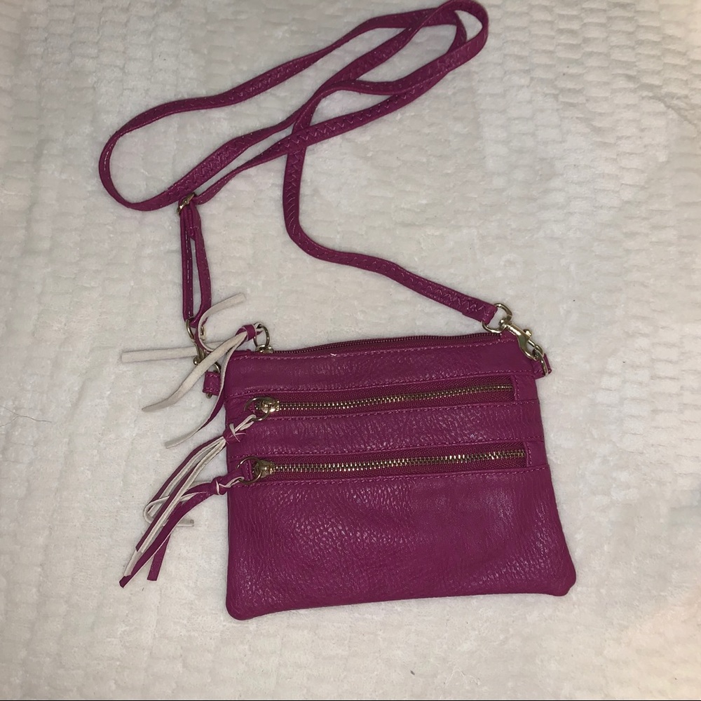 Multiple zipper fuchsia bag